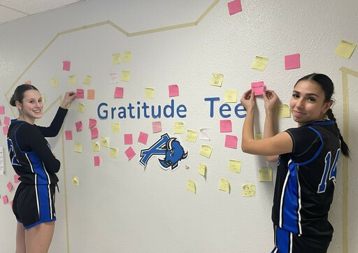 Ardrossan Junior Senior High students post sticky notes on the school’s Gratitude Tee wall in celebration of Pink Shirt Day on February 26.